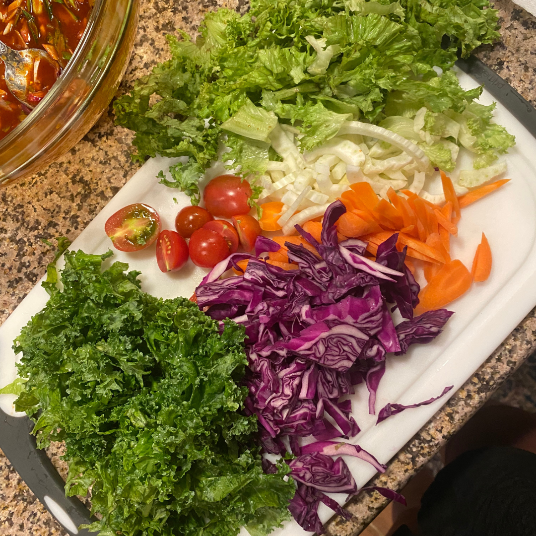 Kale, red cabbage, sweet heirloom tomatoes, carrot, fennel, lettuce for bibimguksu