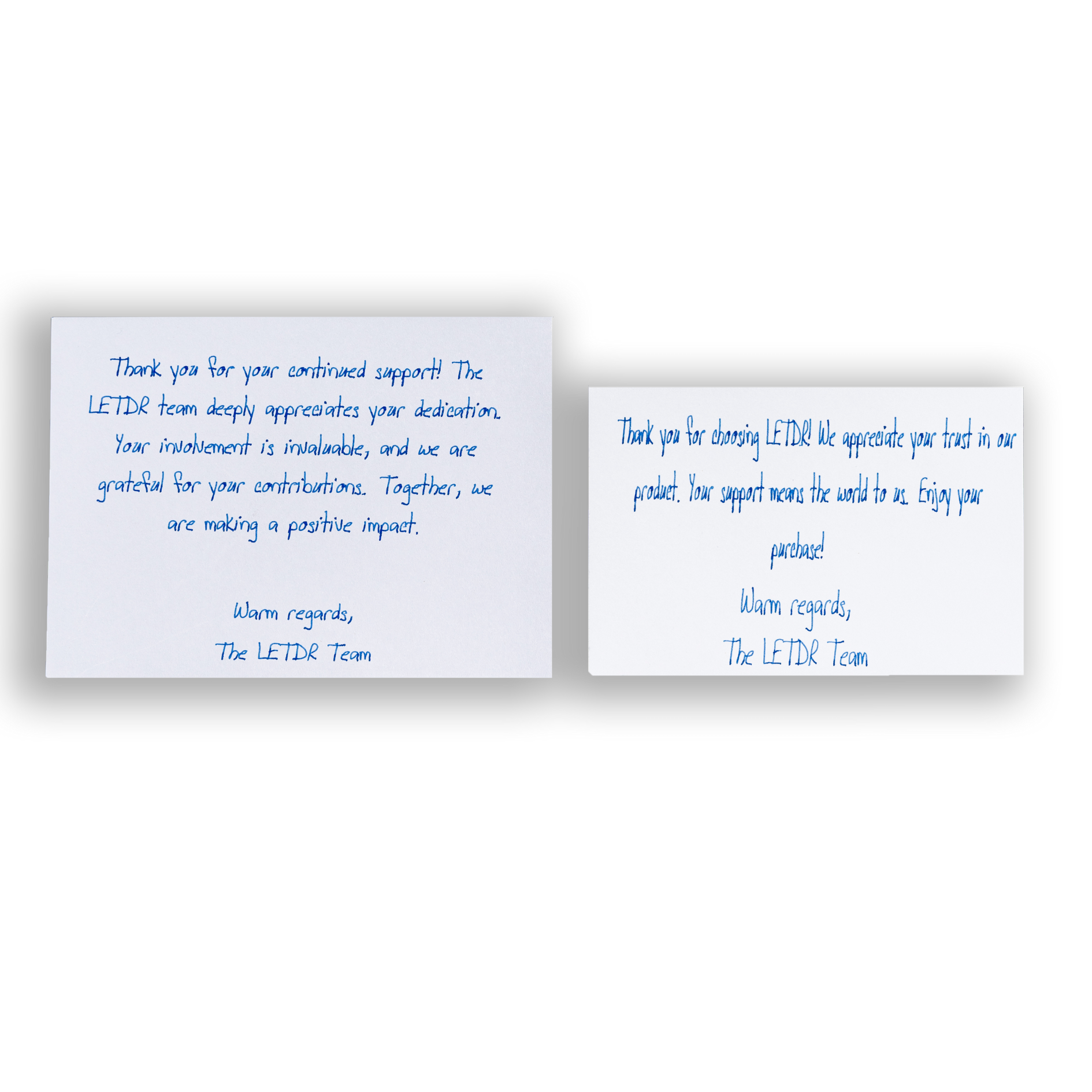 Two white  thank you cards, showcasing a beautiful handwritten message on it.