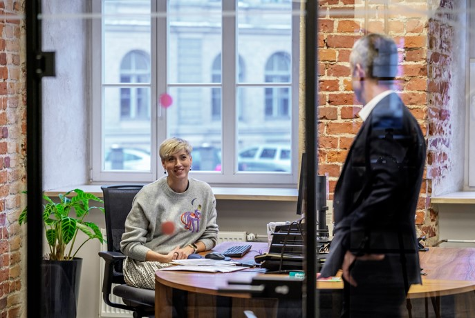 two dots. employees at the office